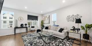 Welcome to this like new fully furnished home located in The Village at Courthouse Commons in Spotsylvania. Gallery 6