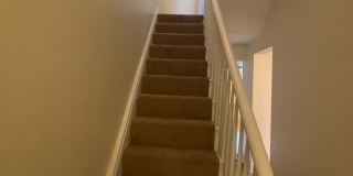 Great 2 bed 2 bath with bonus attic space house located steps from shopping. Gallery 10