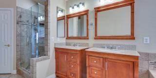 Summerlin!! 5 bedroom home!! W/Bed bath downstairs!! 3 Car Garage!! Synthetic grass in front yard. Back has patio. Summerlin!! 5 bedroom home!! W/Bed bath downstairs!! 3 Car Garage!! Synthetic grass in front yard. Back has patio. Gallery 45
