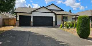 Spacious Tacoma Home with Gas Fireplace, 3-Car Garage & Covered Patio! Gallery 1