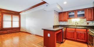 Charming 1-Bedroom Apartment with Exposed Brick, Hardwood Floors & Updated Kitchen Gallery 15