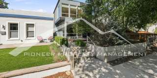 Lovely Single Family Home With Central AC, Rooftop Patio, and a 2 Car Garage! Gallery 1