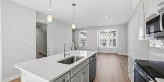 This home presents a harmonious blend of elegance, flexibility, and modern convenience within a welcoming community setting. Gallery 14