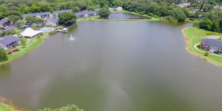 1/1 in the Heart of Brandon with a lake view! Gallery 17