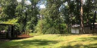 Travelers Rest !! 3 BR, 2 BA with Great Living Space - Den, Bonus Room, Primary Suite has a HUGE walk in Closet, Laundry Room, private screened in porch & deck AND a storage shed out back.  Fresh Paint and New LVP Floors Gallery 24