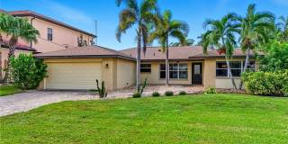 3BR/2BA Cape Coral Waterfront Home with Private Pool, Boat Lifts & 2-Car Garage — $2,800/mo Gallery 1