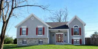 4 Bed Lenexa Home w/ Finished Basement, Solar, 3 Car Garage and Fenced Yard!! Gallery 1