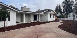 Stunning new build, top of the line everything, walk to town location, close to schools! INCLUDES ADU!! Gallery 1