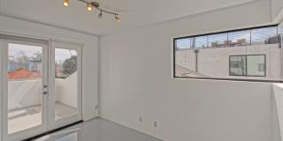 MODERN & BRIGHT. TOP-FLOOR, 4BR3BA HOUSE-LIKE APARTMENT W/ OPEN FLOOR PLAN, 3 DECKS FOR INDOOR/OUTDOOR LIVING & 2-CAR GARAGE JUST BLOCKS TO ABBOT KINNEY, PARK & MINS TO CANALS & BEACH! Gallery 35