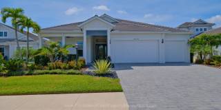 PURE PERFECTION! LAKEHOUSE COVE WATERSIDE- 3 BEDROOM PLUS HOME OFFICE- POOL HOME ! Gallery 1