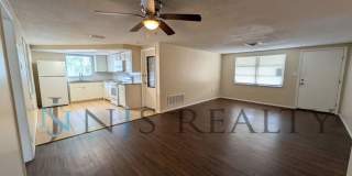 True 3 Bed~2 Bath~with garage. Over 1,000 sq ft, with updated kitchen & bathrooms, large open living space & a fenced in yard!! Gallery 5
