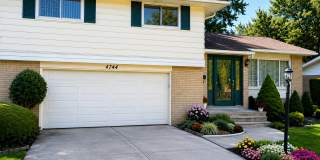 Spacious 3-Bedroom Split-Level with Formal Dining Room, Fireplace, and Fenced Backyard Gallery 1