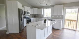 Bright & modern main floor living in newer home! Gallery 5