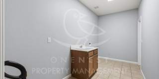 spacious 4-bedroom, 2.5-bathroom home in the desirable Whitney Ranch Gallery 14