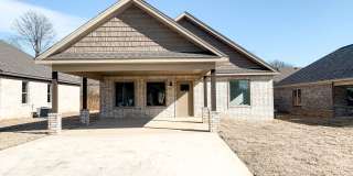 3 Bed, 2 Bath with Fenced Yard, Two-Car Carport, and Lawn Care Included Gallery 1