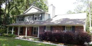 GORGEOUS NE 4/2.5 on 1 Acre w/ Fenced Yard, Garage, Washer/Dryer, Spa Tub, Stainless Appliances, & MORE! Avail Septmeber 1st for $3175/month, Inc Lawn Maint! Gallery 1