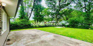 Lovely Three Bedroom Home in KCMO and an Updated Kitchen  w/ Granite and SS Appliances, including a Fenced Yard! Gallery 28