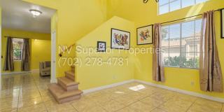 NW!! 4 Bedrooms!!! All Tile and Pergo flooring T/O!! NO Carpet!!! Low Maintenance Desert landscaping front and back!! With Patio cover in back!!! Gallery 9