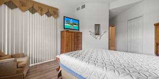 Experience Bell Tower Park. GATED ground floor 2 Bed 2 Bath Den 1 Car Garage Condo. Gallery 22