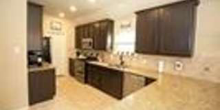 This adorable rental home holds all your favorite features for modern living in the up-and-coming city of Anne! Gallery 5