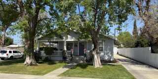 Charming 2 Bed / 1 Bath Corner Lot Home with Wraparound Porch Gallery 1