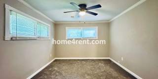 Lovely Three Bedroom Home in KCMO and an Updated Kitchen  w/ Granite and SS Appliances, including a Fenced Yard! Gallery 15