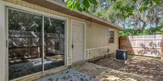 Spacious 3BR/2BA Ocala Home with Modern Finishes,Fireplace Floor-to-Ceiling Sliding Glass Doors & Private Fenced Patio Gallery 1