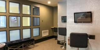 Beautiful large studio unit updated flooring, balcony with a pool view! Gallery 6