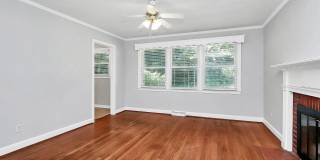 Discover the charm of this brick ranch nestled in the heart of Madison Park Gallery 10