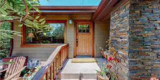 Impeccably restored Craftsman Securely Gated and Hedged for Privacy! Impeccably restored Craftsman Securely Gated and Hedged for Privacy! Gallery 1