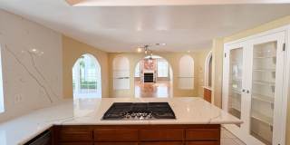 Welcome to this stunning 4-bedroom, 3-bathroom home located in the desirable La Costa neighborhood of Carlsbad! Gallery 7