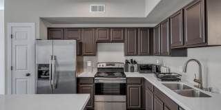 Updated 2 Bedroom 2.5 Bathroom Gated Community Home W/ TWO CAR GARAGE Updated 2 Bedroom 2.5 Bathroom Gated Community Home W/ TWO CAR GARAGE Gallery 1