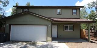 Price Improvement & $300 Move-In Special | Modern East Flagstaff Home with Loft, A/C & 2-Car Garage Price Improvement & $300 Move-In Special | Modern East Flagstaff Home with Loft, A/C & 2-Car Garage Gallery 1