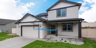 Woodbridge South Home with 4 Bedrooms and 3 Bathrooms in Post Falls build in 2021! Gallery 1