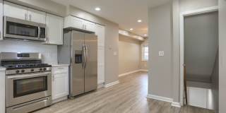 Semi- Furnished 2BR/2BA Row Home in Baltimore – Ready for Immediate Move-In! Gallery 1