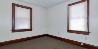 Charming 3BR Home with Classic Woodwork, Porch & Bonus Attic Space Gallery 11