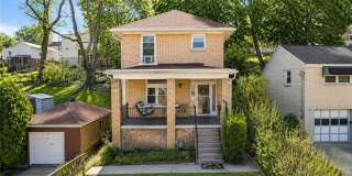Brookline Beauty: Updated 3-Bed Home with Detached Garage Gallery 1