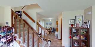 2 BR, 1.5 BA Clive split level duplex.  Deck and one car attached garage. Gallery 5