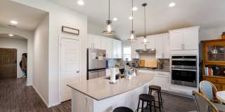 4 Bedroom Home with Stone Patio, Built-In Gazebo & Amenity-Rich Community Living Gallery 7