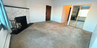 Spacious & Bright Top Floor Condo in East Anchorage, Close to Base + W/D In Unit! Gallery 1