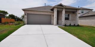 Home has an amazing entrance leading to the large family room open to the kitchen and dining room Gallery 1