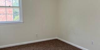 Updated 2 bedroom, 1 bath apartment with walk-out patio off of kitchen, and updated flooring. Gallery 5