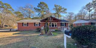 Charming 3 Bed 1.5 Bath Home with Flex Room Gallery 1