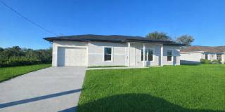 BRAND NEW MODERN SF HOME 3BD+den/2BA with GARAGE IN LEHIGH ACRES! Gallery 1