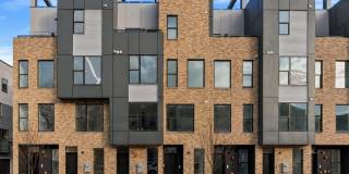 Garage parking, private outdoor space, and skyline views—this Northern Liberties home checks every box. Gallery 1