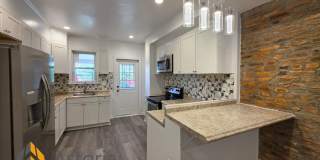 3 Bedroom End Unit with Finished Basement and Fenced Yard on E 28th Street 3 Bedroom End Unit with Finished Basement and Fenced Yard on E 28th Street Gallery 1