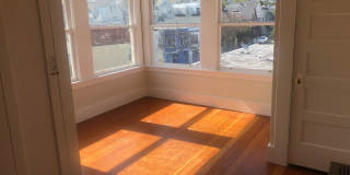 Updated Top Floor Studio apartment with Gorgeous 270-Degree Views of Bernal Heights Gallery 1