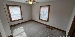 Charming 3BR Home in Norwood with Fenced Yard, Detached Garage & Workshop – Prime Location! Gallery 4