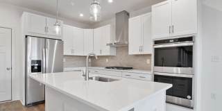 This stunning luxury 2-story condo has 3 beds & 2.5 baths with over 1500 sq ft of living space. Gallery 6