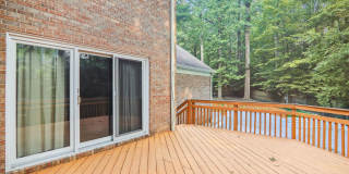5 BR 4.5 BA home with inground heated pool and extensive hardscape! Gallery 15